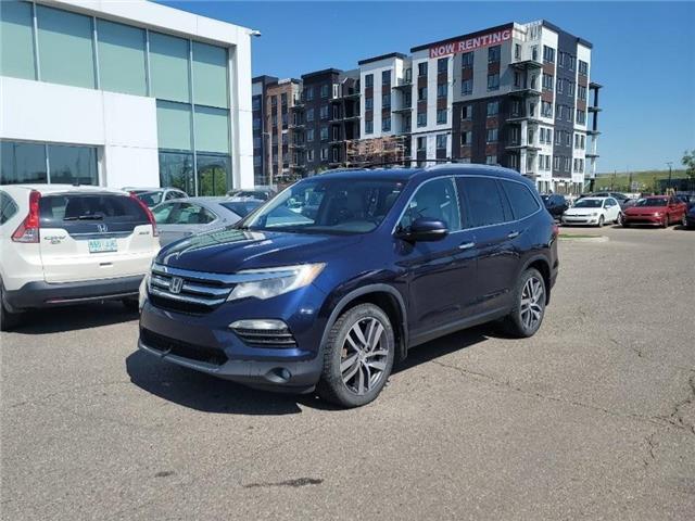 2017 Honda Pilot Touring (Stk: ST-332C) in Calgary - Image 1 of 1