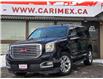 2017 GMC Yukon SLT (Stk: 2412603) in Waterloo - Image 1 of 35