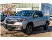 2019 Honda Ridgeline EX-L (Stk: SU7514) in Calgary - Image 1 of 33