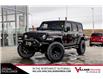 2021 Jeep Wrangler Unlimited Sport (Stk: SQ0855A) in Calgary - Image 1 of 39