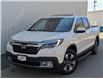 2019 Honda Ridgeline Touring (Stk: H22944A) in North Cranbrook - Image 1 of 14