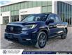 2021 Honda Ridgeline Touring (Stk: SU7699) in Calgary - Image 1 of 23